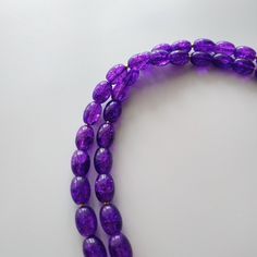 < Long glass beaded necklace with amethyst stone pendant > Very original and elegant combination. The stone is natural amethyst. Amethyst is the stone of St. Valentine and faithful love. It carries the energy of fire and passion, creativity and spirituality. This necklace can be beautiful accent to any look! > Necklace length - 89 cm (35 in) > Necklace weigth - 78 gm Spiritual Purple Spacer Beads, Purple Faceted Beads Crystal Necklace For Spiritual Use, Purple Oval Beaded Necklaces For Jewelry Making, Purple Amethyst Beads For Jewelry Making, Purple Glass Beaded Necklaces With Round Beads, Purple Glass Beaded Necklace With Round Beads, Purple Polished Beads Crystal Necklace As Gift, Amethyst Gemstone Beads For Gifts, Purple Oval Faceted Bead Necklaces