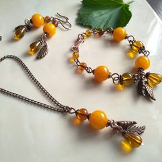 This beautiful jewelry set makes a great holiday gift. The earrings are 6 cm long. The size of the bracelet is 18 cm. If necessary, the size can be increased. Pendant chain 50 cm. This jewelry set is already made. I will send it to you within one day. Your package will be tracked. Handmade Amber Beaded Bracelets Gift, Handmade Amber Beaded Bracelet Gift, Handmade Amber Beaded Bracelet For Gift, Handmade Yellow Jewelry Sets As A Gift, Bohemian Amber Beaded Bracelets For Gift, Bohemian Yellow Beaded Bracelets With Natural Stones, Handmade Amber Beaded Bracelets, Yellow Bohemian Beaded Bracelets With Gemstones, Handmade Yellow Bohemian Jewelry