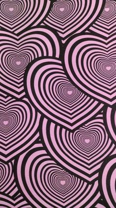 an abstract painting with black and pink circles in the center, on a purple background