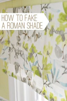 how to fake a roman shade with flowers and leaves on the valance, hanging in front of a window