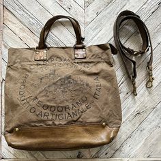 by Campomaggi Handmade in Italy Material: cowhide leather, canvas Size: 11" x 12" inches Color: verde militare Campomaggi Bags, Canvas Totes, Burlap Sacks, Man Bags, Hot Bags, Gold Vermeil Jewelry, Canvas Bags, Tote Pattern, Microfiber Cloth