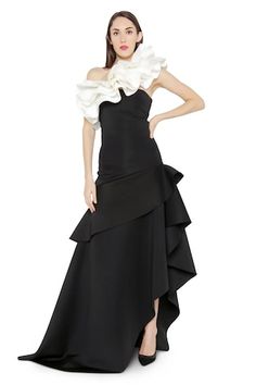 Black gown with asymmetric ruffle detailing under the hip. Paired with contrasting white ruffles. - Aza Fashions Asymmetric Gown, Gowns Black, Black Plain, Ladies Gown, Black Gown, Aza Fashion, Ruffles, Types Of Sleeves, Custom Made