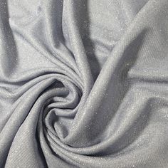 a close up shot of a silver fabric