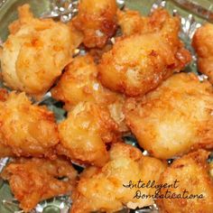 some fried food is on a glass plate