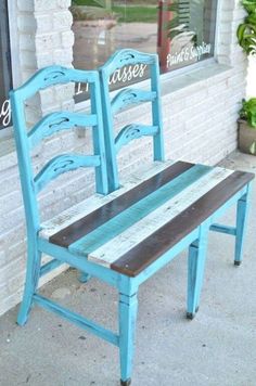 a blue chair sitting on top of a sidewalk