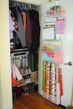 an organized closet with shoes and other items