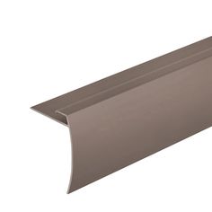 an image of a metal gutter that is brown and has a long, curved edge