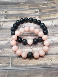 You will receive a set (2 pieces) of bracelet. These bracelets are made of natural jade stones ( dark gray ) and rose quartz beads. They are 10 mm and I used double durable and high quality stretch cord. If you are looking for a couples/friendship bracelet, you found the one!  Jade is believed to bring luck, balance, and harmony while rose quartz promotes unconditional love, forgiveness, peace and compassion. It also creates harmony in relationships and teaches the wearer about the true essence of love. Beaded Couple Bracelets, Couple Matching Bracelets, Promise Bracelets, Bracelets For Couples, Bat Jewelry, Promise Bracelet, Distance Bracelets, Yellow Jewelry, Gothic Necklace