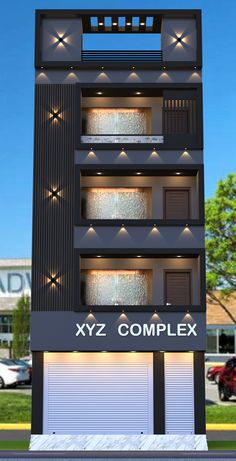 a tall black building with lights on it's windows and the words xyz complex