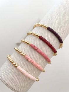 14k Gold Heishi Color Block Bracelet – georgia layne Pink Heishi Beads Stretch Bracelet, Everyday Pink Heishi Beads Stretch Bracelet, Everyday Stackable Heishi Beads Stretch Bracelet, Gold Stacked Heishi Beads Stretch Bracelet, Bracelet Layering Ideas, Sliver Necklaces, Heishi Jewelry, Sliver Necklace, Wear Rings