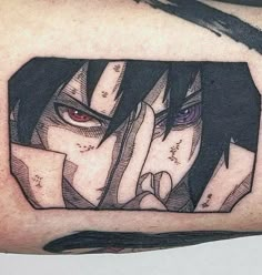 a man's arm with an anime character tattoo on the upper half of his arm