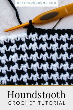 the crochet stitch is being worked on by a pair of yellow handled scissors