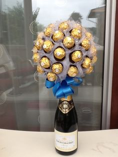 a bottle of champagne and some chocolates in it