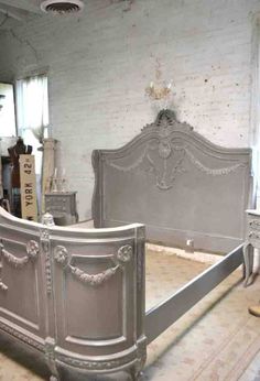 an old fashioned bed frame is in the process of being made into a bedroom set