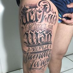 a person with a tattoo on their leg