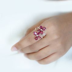 Ruby Butterfly Cocktail Ring This Ruby Butterfly Cocktail Ring is crafted from Solid Gold and adorned with a single, precious ruby that glitters like a butterfly's wings. The unique design and craftsmanship combine to make this ring a beautiful and timeless piece of jewelry that will be treasured for years to come. Ruby Butterfly Ring, Diamond Butterfly Ring With Gemstone For Formal Occasions, Formal Diamond Butterfly Ring With Gemstone, Formal Butterfly Gemstone Ring In Fine Jewelry Style, Luxury Butterfly Ring With Gemstone For Gift, Luxury Butterfly Ring With Gemstone For Wedding, Elegant Diamond Butterfly Ring With Gemstone, Elegant Butterfly Diamond Ring With Gemstone, Luxury Gemstone Butterfly Ring As Gift