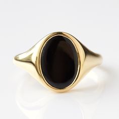 Introducing CE by Carrie Elizabeth.  Our first jewellery collection designed primarily for men! Featuring a wearable mix of classic & contemporary designs for partners, friends & family.  Pieces to be shared, gifted and of course borrowed! Bold black onyx takes centre stage in our sleek oval signet ring  This soothing stone has the power to relieve you from worries, tension, stress and fear. Read more in our guide to beautiful gemstones here  Buying a gift for someone special? Why not add the finishing touch with one of our gorgeous gift cards and gift bags? Click here to view Oval Signet Ring, Onyx Signet Ring, Semi Precious Stone Bracelet, Beautiful Gemstones, Flat Back Earrings, Solid Gold Necklace, Centre Stage, Jewelry Rings Diamond, Contemporary Designs