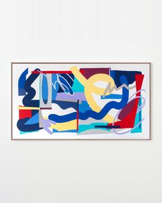 an abstract painting with blue, red, yellow and white colors on the wall above it