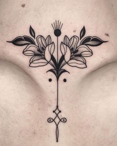 a woman's stomach with flowers on it