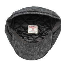 1. Genuine Harris Tweed 2. 'Peaky Blinders'' Style 3. Quilted Satin Lining Great Shape Traditional Newsboy 8-Piece Cap made from Genuine Harris Tweed. This panelled Harris Cap is a deeper fit than the Arran and boasts an elongated peak. Quilted satin lining. Small - 56cm diameterMedium - 58cm diameterLarge - 60cm diameterExtra Large - 62cm diameter Classic Black Hat With Herringbone Pattern, Black Herringbone Pattern Flat Cap, Black Tweed Cap, Black Casual Tweed Hat, Casual Black Tweed Hat, Peaky Blinders Cap, 1920s Men, Black Herringbone, Newsboy Cap