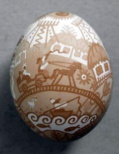 an egg with designs painted on it