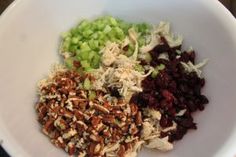 a white bowl filled with different types of food