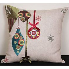 a decorative pillow with ornaments on it