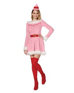 a woman in a pink dress and santa hat