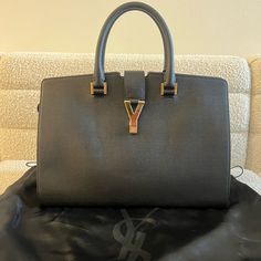 Brand New Never Worn Textured Black Leather. Leather Makes It Resistant To Scratches And Gives Structure To The Bag Comes With Original Ysl Dustbag Ysl Cabas Bag, Ysl Bag Large, Ysl Canvas Bag, Ysl Uptown Small Tote, Saint Laurent Tote Bag, Saint Laurent Black Tote Bag, Yves Saint Laurent Bags, Medium Tote, Womens Tote Bags