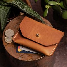 "This pouch wallet/purse this 100% handcrafted in Lincoln, UK. Made from a single piece of high-quality 5/6oz (2.5mm) full-grain leather this rugged yet classic design will keep your coins, cash and card secure.   With optional personalisation, this item is the perfect gift for Birthdays, Father's Day, Mother's Day or Anniversaries especially 3-year wedding anniversaries, LEATHER!  Shire Supply Company uses only the best quality leather, sourced from a UK-based tannery with over 100 years of lea 3 Year Wedding Anniversary, Lincoln Uk, Handmade Leather Purse, Handmade Leather Wallet, Veg Tan Leather, Money Clip Wallet, Handcrafted Leather, Vegetable Tanned Leather, Leather Purse