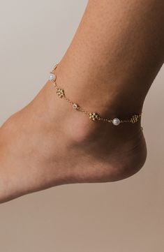 This slim chain-link anklet grounds your ensembles in subtle shine. 9 3/4" length; 2" extender Imitation-pearl size: 5.5–6mm Sterling silver or sterling silver with 14k-gold plate/plastic/cubic zirconia Imported Elegant Pearl Chain Anklet For Party, Elegant Anklets With Extender, Elegant Pearl Anklets For Party, Pearl Chain Anklet For Party, Elegant Adjustable Metal Anklets, Elegant Pearl Chain Anklets For Wedding, Elegant Wedding Anklets With Adjustable Chain, Elegant Wedding Anklets With Pearl Chain, Elegant Wedding Pearl Chain Anklets