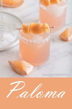 two glasses filled with pink lemonade and garnished with pineapple on the rim