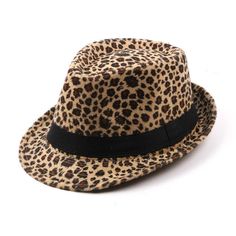 Do you love attention from others? If yes, then this Fedora Trilby Hat by Innovato Design is for you, otherwise, if you love the design then you can still give it a go. The picture does not reveal all the good qualities of this hat because this hat has properties that are stated as follows. It is made from acrylic cotton and polyester materials so comfortability is at its finest when you wear this hat. Its leopard print is perfectly designed all throughout this hat to make a continuous, smooth pattern. It has a black belt hatband and tall, teardrop-shaped crown with pinched front that give you a charming look. Also, the snapped back and downward front brim adds personality to your look. You can wear this with your casual style so dressing up is made easier.  Product Highlights:   Made from Retro Adjustable Fedora For Summer, Fitted Flat Cap For Summer, Retro Fitted Fedora For Summer, Casual Mini Hats With Flat Brim For Party, Casual Mini Hat With Flat Brim For Parties, Casual Flat Brim Mini Hats For Parties, Adjustable Casual Hat Bands For Parties, Adjustable Casual Hat Bands For Party, Casual Adjustable Fedora For Party