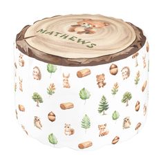 an animal themed wooden stool with the name nathan on it's side and images of animals, trees, and leaves