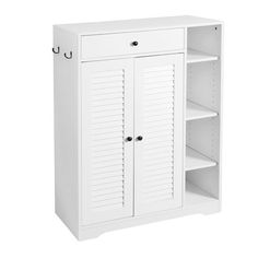 a white cabinet with shutter doors and shelves