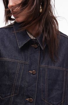 A boxy silhouette and indigo-dyed denim refresh the classic design of an all-cotton trucker jacket that adds the perfect finishing layer to your look. 24" length (size Medium) Front button closure Spread collar Button cuffs Chest on-seam pockets; front welt pockets 100% cotton Machine wash, line dry Made in Turkey Relaxed Fit Dark Wash Rigid Denim Jacket, Relaxed Fit Dark Wash Denim Jacket, Spring Dark Wash Rigid Denim Jacket, Indigo Denim Jacket With Patch Pockets For Fall, Relaxed Fit Rigid Denim Jacket For Fall, Indigo Utility Denim Jacket With Relaxed Fit, Spring Everyday Indigo Denim Jacket, Oversized Indigo Denim Jacket, Oversized Indigo Denim Jacket For Fall