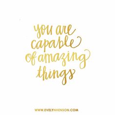 the words you are capable of amazing things written in gold ink on white paper with a black