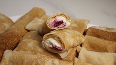 there are some crepes that have been cut in half and stacked on top of each other