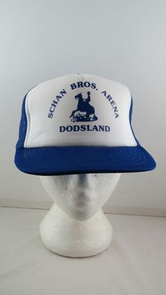 Vintage Trucker Hat Up for sale is a vintage trucker hat. This hat is for Schan Bros Arena. It has a blue base colour with white front. There is a graphic screened on the front highlighted by a cowboy riding a horse. What a great vintage hat do not miss out on it. This hat is in mint condition. There is no damage to the hat. This hat is a one size fits all adult snapback. All items have free shipping within continental North America. I will ship internationally, please contact me for rates. All Old South Apparel Hats, Front Highlights, Riding A Horse, Vintage Trucker Hat, Vintage Trucker Hats, Vintage Patches, Vintage Hat, Vintage Hawaiian, White Horse