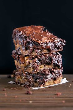 three chocolate brownies stacked on top of each other