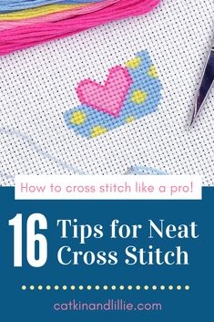 the cross stitch pattern is shown with scissors and thread on it, which are used to make