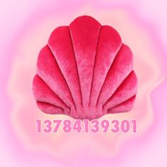 a pink scallop shell sitting on top of a purple background with the word 1039