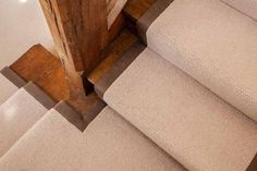 an upholstered stair tread is seen from above