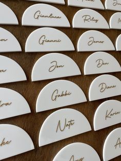 there are many name tags on the table for each person to write or label them