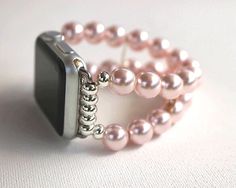 Pink Crystal Pearl Watch Band for Apple Watch This watch band is handcrafted. To measure wrist: Use a tape measure, measure the area where you wear the Apple Watch. Order this measurement. I will adjust for the measurements of the Apple Watch when I make the watch band. Watch band is made with Pink Crystal Pearls . They are paired with plate bar spacers. This watch band is stretchy for easy on and off. The Apple Watch is not included #2821 Please let me know if you need more pictures or if you h Apple Watch Pink, Diy Watch Band, Pearl Watch, Beaded Watches, Watch Band Bracelet, Smart Jewelry, Pink Watch, Accesories Jewelry, Pink Swarovski