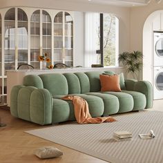 a living room filled with furniture and a washing machine