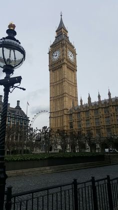 the big ben clock tower towering over the city of london