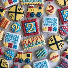 decorated cookies are arranged on a table for a birthday party or baby's first birthday