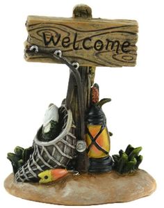 a welcome sign with shoes and fishing lures on the bottom, next to a fish hook