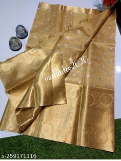 DISCRIPTION Tissue Saree Banarasi Silk Saree With Big Kanchi Border Saree Wedding Wear Girlish Bridal Sari Gift Indian Saree Festive Wear Running Blouse pattu saree.  PRODUCT DETAILS Auction For: 1 Saree with Blouse Piece Color: As shown in the picture Condition: New Work: zari border Saree fabric : Kota silk Saree length : 5.5 meters Blouse length : 0.8 meters Washing Instructions: Dry Clean Only Occasions: Wedding Wear, Party Wear, Festive Wear, Durga Puja, Indian Wear, Sangeet Wear, Bridal Wear, Chrismas Day, Mothers Day, Haldi Wear. Fall and Pico: On request (Please contact for fall and piku work) Blouse stitching: Available for an additional cost. (Please contact for Blouse Stitching Work) Petticoat: Available for an additional cost. Please contact for Petticoat) NOTE *Actual color ma Gold Embroidered Raw Silk Fabric For Wedding, Traditional Festive Marriage Wear, Gold Organza Blouse Piece With Cutdana, Gold Organza Blouse Piece With Cutdana Detail, Gold Chanderi Sets With Motifs, Tissue Silk Blouse Piece For Wedding During Diwali, Wedding Lehenga In Katan Silk With Dori Work, Katan Silk Lehenga With Dori Work For Wedding, Gold Organza Blouse Piece For Eid